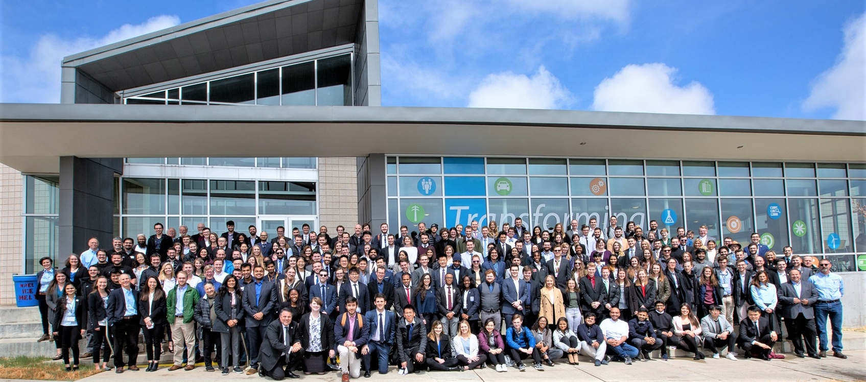 Photo of about 100 participants at the U.S. Department of Energy Solar Decathlon.