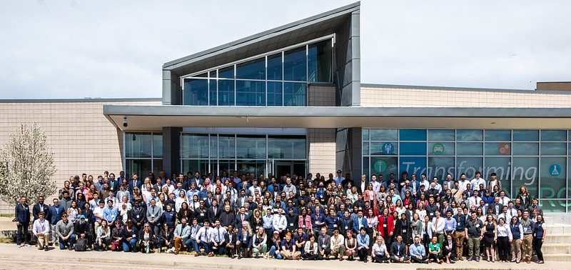 Students participating in the 2022 Design Challenge and 2023 Build Challenge pose on the National Renewable Energy Laboratory campus during the Solar Decathlon 2022 Competition Event, April 22–24, 2022.