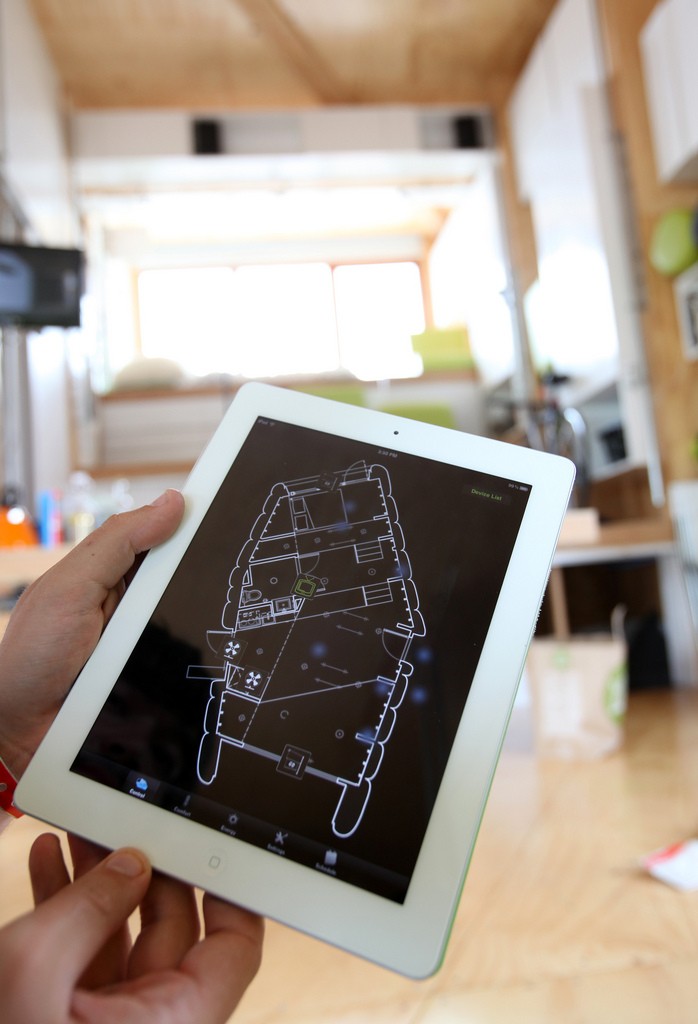 Photo of a house diagram displayed on an iPad.