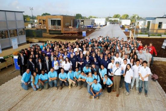 The official all-teams photo for the U.S. Department of Energy Solar Decathlon 2017 at the 61st & Peña Station in Denver, Colorado, October 5, 2017. The competition and public event officially opened today. (Credit: Jack Dempsey/U.S. Department of Energy Solar Decathlon)