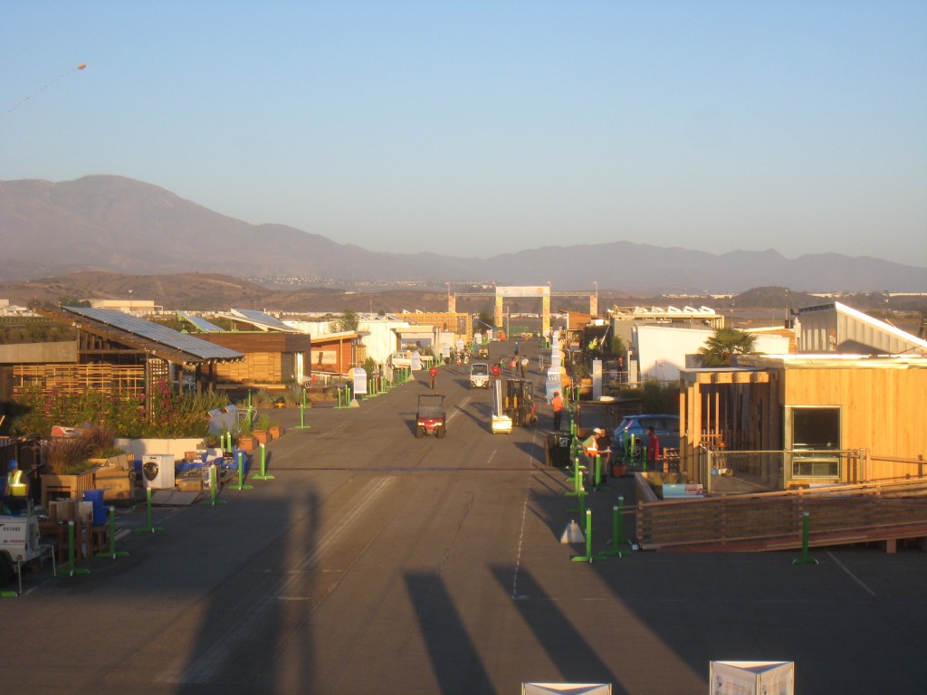 Photo of the Solar Decathlon village near the end of assembly.