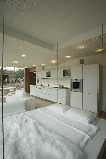 Photo of the kitchen and living spaces of the Team Ontario/BC Solar Decathlon 2009 house.