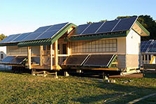 Photo of the University of North Carolina at Charlotte's solar-powered house at Solar Decathlon 2002 on the National Mall.