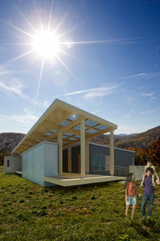 Illustration of the Solar Homestead in a mountain setting. A family of three is in the foreground.>