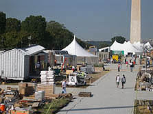 Photo of the South side of the 2005 Solar Decathlon solar village under construction.