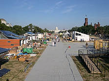 Photo of the 2005 Solar decathlon solar village under construction.