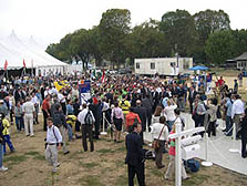 Photo of large crowd watching 2005 Solar Decathlon ribbon cutting ceremony.