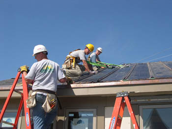 Photo of the University of Missouri Rolla students working on their Solar Decathlon house