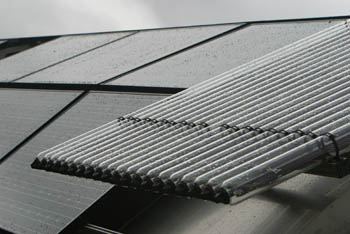 Photo of raindrops on a PV array.