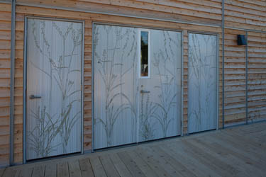 Photo of the exterior porch doors of Iowa State University Solar Decathlon 2009 house.