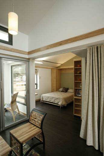 Photo of the living and bedroom areas of the Iowa State University Solar Decathlon 2009 house.