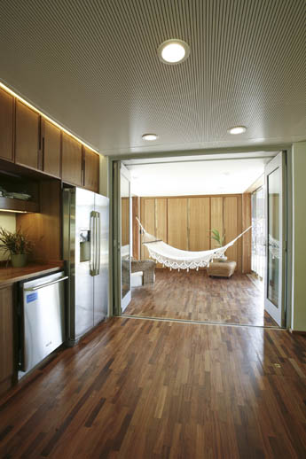 Photo of the kitchen and enclosed porch areas of the Universidad de Puerto Rico Solar Decathlon 2009 house.