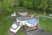 Aerial photo of the Innovation Technology Exploration Center that shows the solar panels on the University of Delaware house.