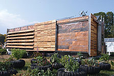 Photo of the University of Virginia's house on the National Mall at Solar Decathlon 2002.