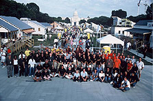 Photo of  large group of students who competed in Solar Decathlon with competition organizers.