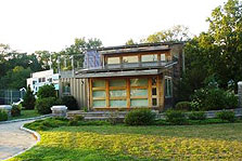 Photo of New York Institute of Technology's solar house in its permanent location at the U.S. Merchant Marine Academy.