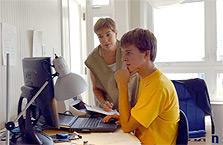 Photo of a student at a computer.