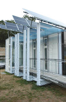 Photo of a house with an entryway covered in staggered PV panels.