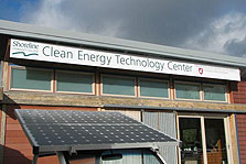 Photo of the Zero Energy House with a sign that reads "Clean Energy Technology Center."