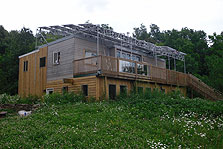Photo of Cornell University's Solar Decathlon 2007 house viewed from the southeast in its permanent location near New York's Finger Lakes.