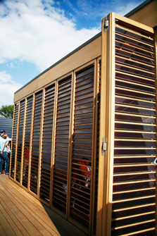 Team Darmstadt's unique "solar louvers" wowed the architectural jury. Photovoltaic cells were integrated into each louver, which surround the entire home.  Shown here are the louvers in a closed position, which maximize the power potential of the solar cells while keeping the home cooler inside.